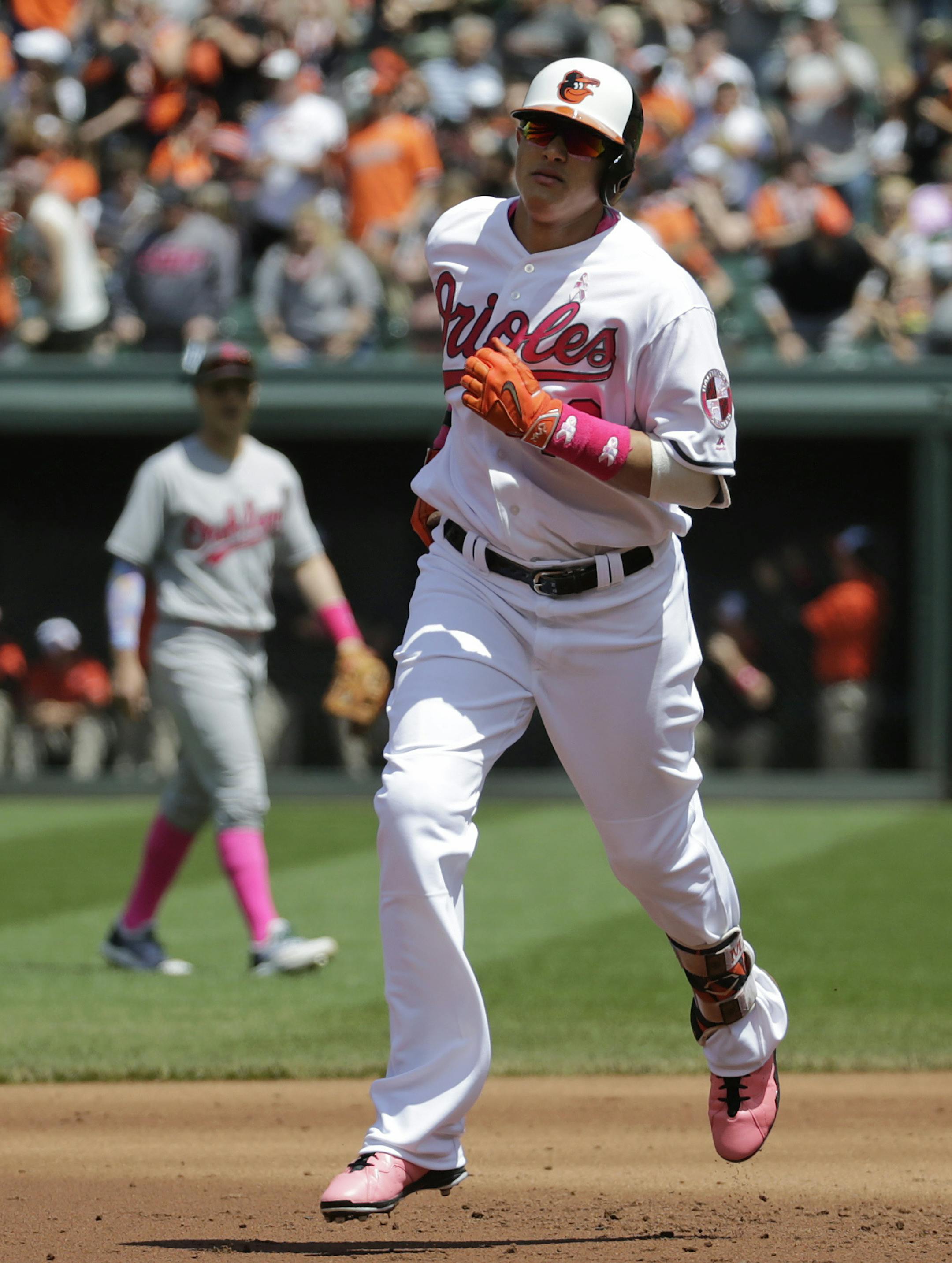 Baltimore Orioles' Manny Machado rounds the bases after hitting a solo home run in the first inning of a baseball game against the Oakland Athletics in Baltimore, Sunday, May 8, 2016. (AP Photo/Patrick Semansky)