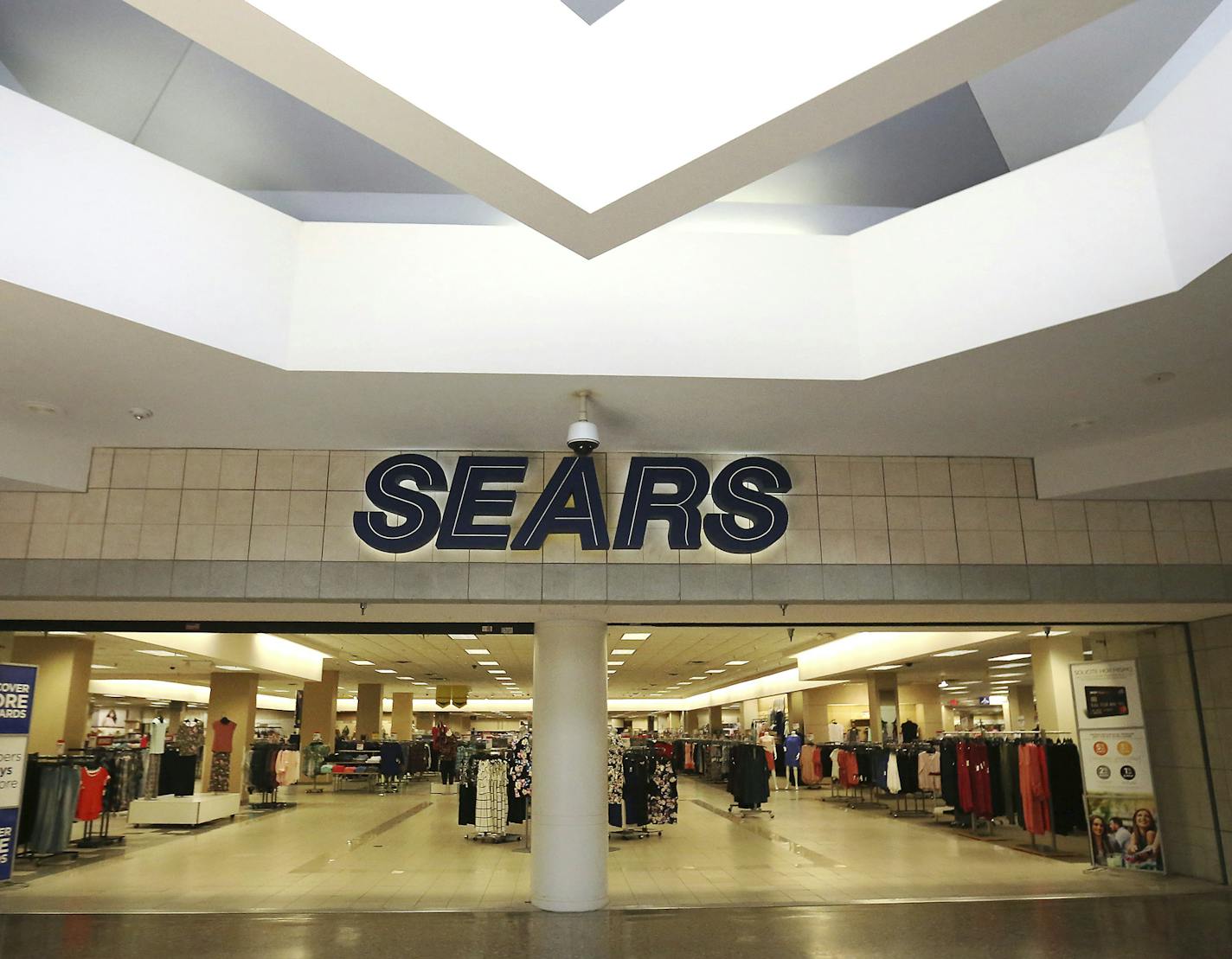 This Thursday, March 23, 2017, photo, shows an empty entrance to a Sears retail store in north Dallas. Retailers&#x2019; first-quarter earnings reports are expected to show challenges that stores face as they struggle with shoppers&#x2019; accelerating shift online and increasing competition. It&#x2019;s happening at a time when stores are shedding jobs at the fastest pace since 2009 and closures are expected to surpass the number during the Great Recession. (AP Photo/LM Otero)