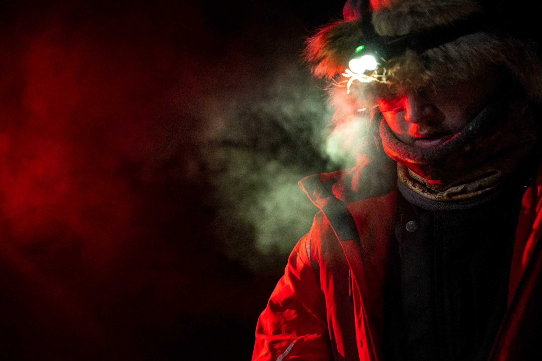 Ero Wallin takes a moment to take a breath after getting into the SkyPort checkpoint at the bottom of the Gunflint Trail around 1:30AM on February 2, 2021.