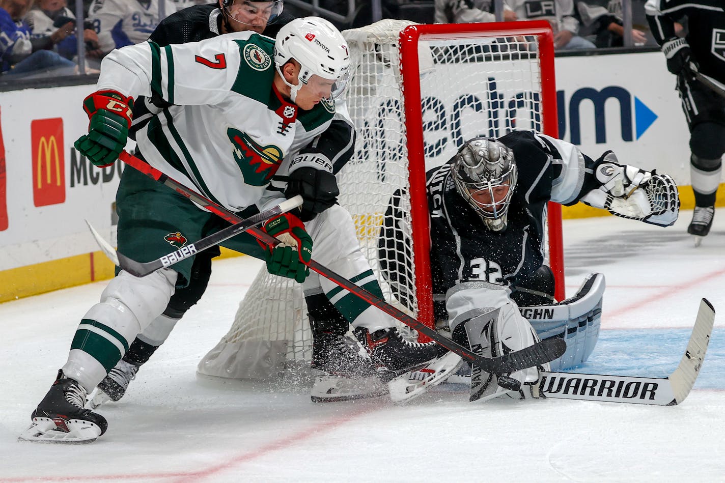 Los Angeles Kings goalie Jonathan Quick blocks a shot by Wild forward Nico Sturm during the second period.