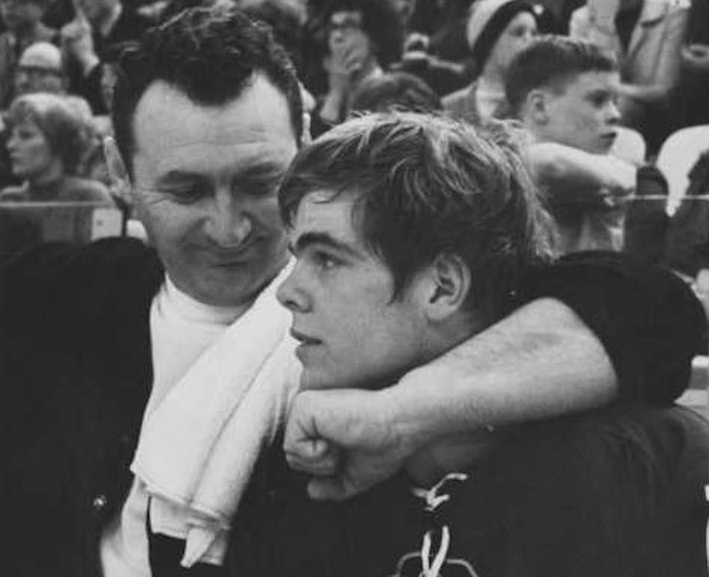 Southwest goaltender Brad Shelstad drew consolation from his coach, Dave Peterson after Shelstad stopped 22 shots in the title game but wasn't named to the all-tournament team.