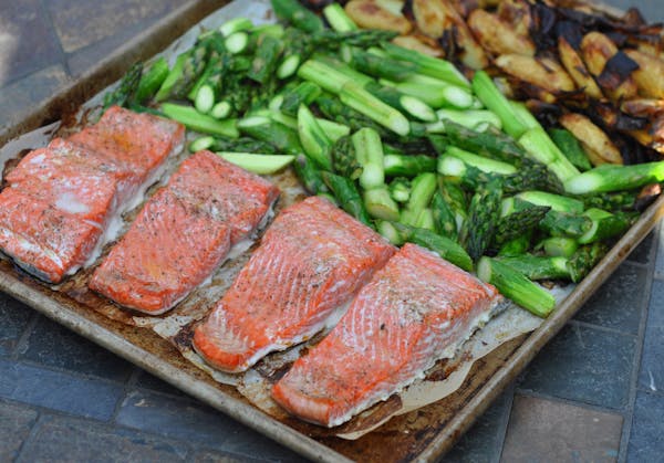 Meredith Deeds, Special to the Star Tribune Salmon with roasted potatoes and asparagus