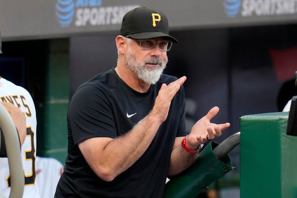 Pirates manager Derek Shelton applauded during an Aug. 8 game in Pittsburgh. Shelton is in Minnesota this week and took a tumble out of a fishing boat
