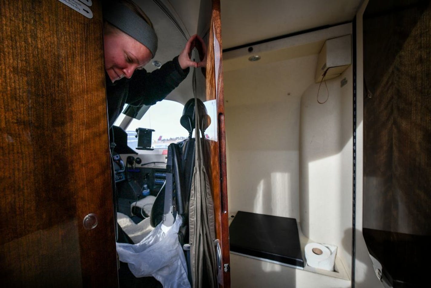 Captain Anna Yilmaz showed the tiny lavatory on the Boutique Air flight. The dorrs close other passengers out but don't close you in. "We don't encourage it" said Captain Yilmaz, "since we are the ones who have to clean it."