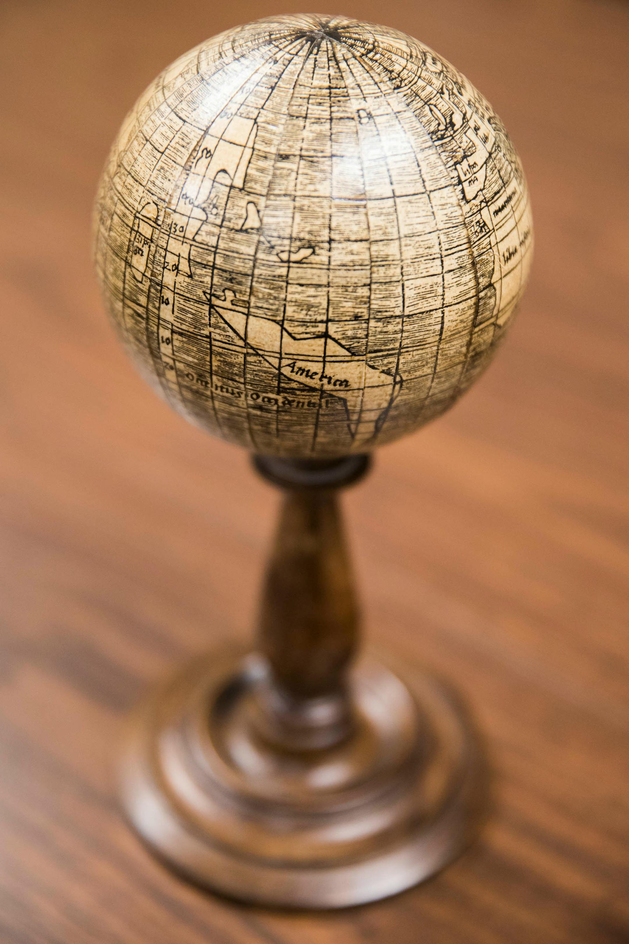 A replica of the globe gores map that has been put onto a three inch globe. ] LEILA NAVIDI ï leila.navidi@startribune.com BACKGROUND INFORMATION: An original print of Martin Waldseem¸ller's 1507 globe gores map is housed at the James Ford Bell Library on the campus of the University of Minnesota in Minneapolis on Wednesday, December 20, 2017. The Waldseem¸ller world map is the first to name America and to represent the Pacific Ocean as a separate body of water.