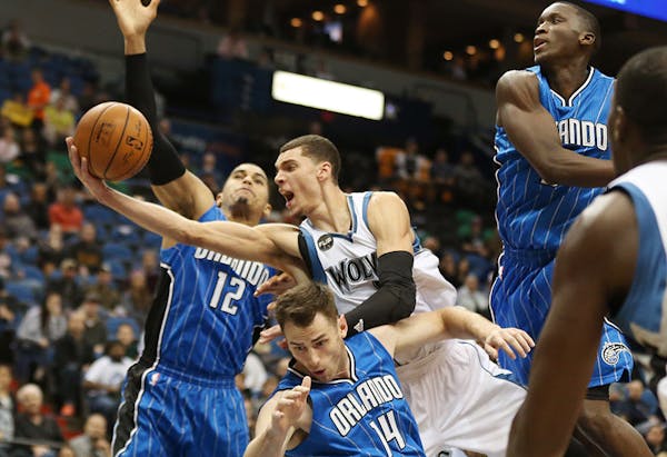 Timberwolves guard Zach LaVine slashed to the basket and was fouled by Orlando's Jason Smith in the second half at Target Center on Monday night.