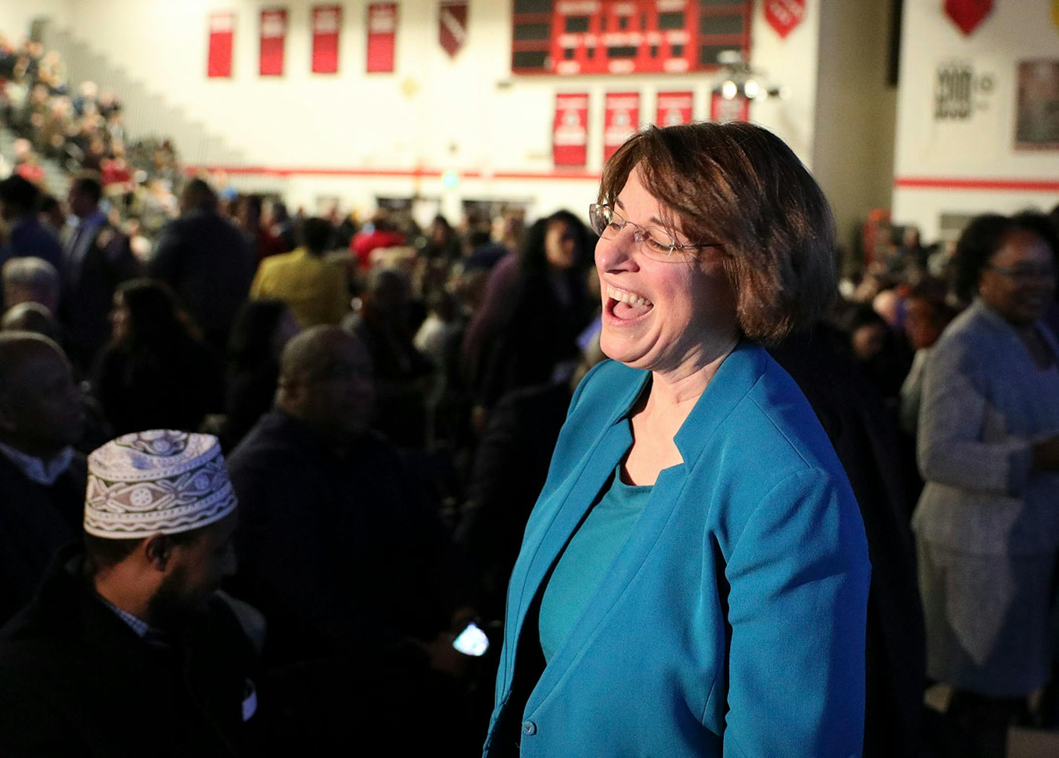 U.S. Sen. Amy Amy Klobuchar greeted fellow politicians prior to Melvin Carter's swearing in ceremony as St. Paul mayor.