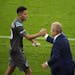 Minnesota United midfielder Emanuel Reynoso (10) was greeted by head coach Adrian Heath as he came off the pitch in the second half. ] JEFF WHEELER �