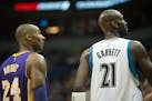 Los Angeles Lakers forward Kobe Bryant (24) and Minnesota Timberwolves forward Kevin Garnett (21)