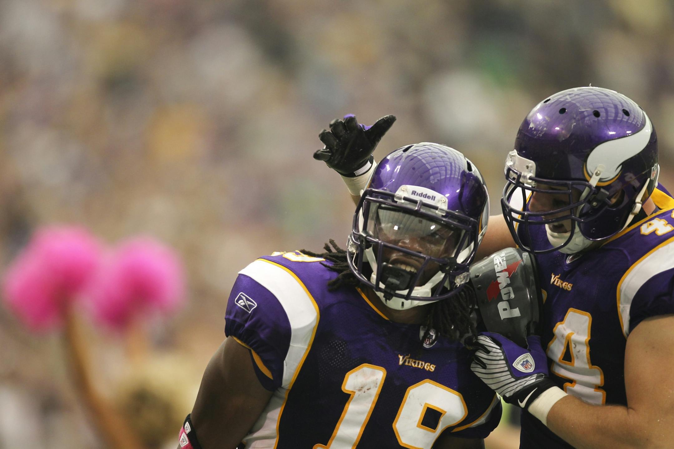 The Vikings' Devin Aromashodu celebrated his 60 yard pass reception in the third quarter with teammate Ryan D'Imperio. The Minnesota Vikings won their first game of the season with a 34-10 win over the Arizona Cardinals Sunday afternoon, October 9, 2011, at Mall of America Field in Minneapolis, Minn.