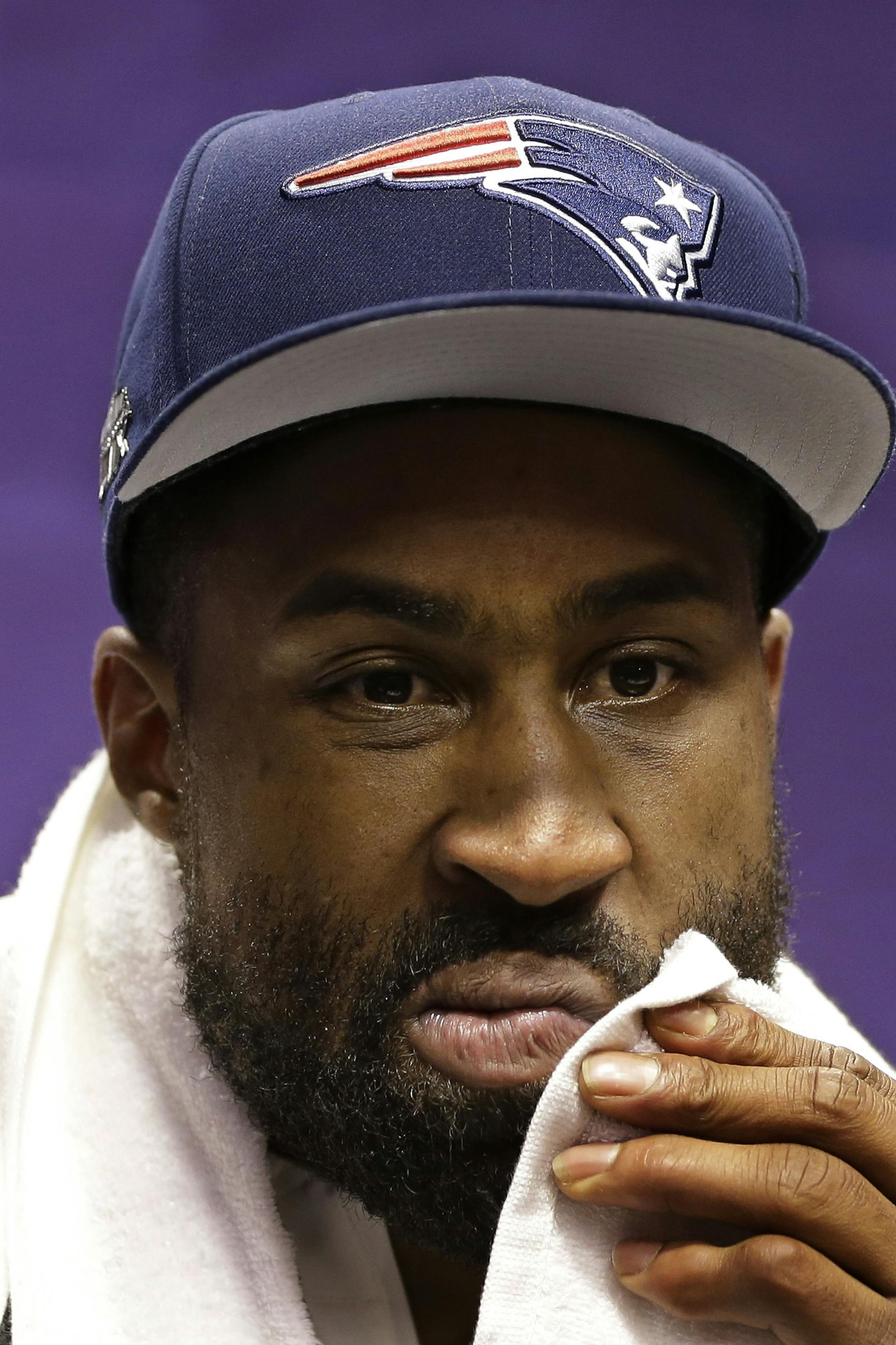 New England Patriots' Brandon Browner answers questions during media day for NFL Super Bowl XLIX football game Tuesday, Jan. 27, 2015, in Phoenix. (AP Photo/Mark Humphrey)