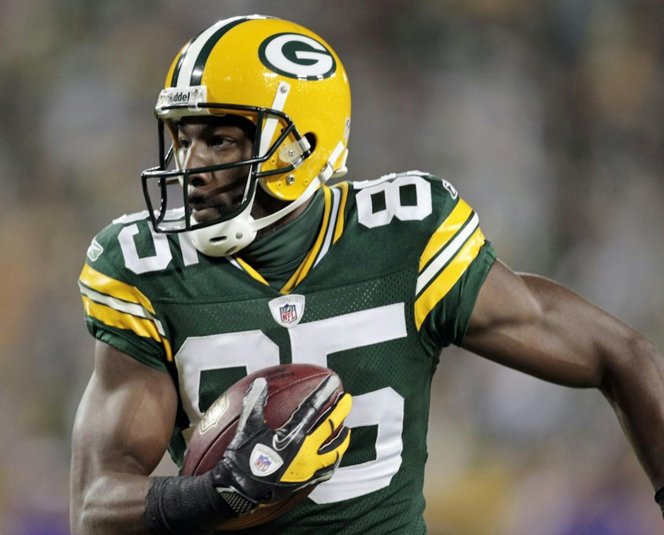 Greg Jennings breaks away for a 24-yard touchdown reception during the first half of game against the Vikings. Jennings signed with Minnesota on Friday.