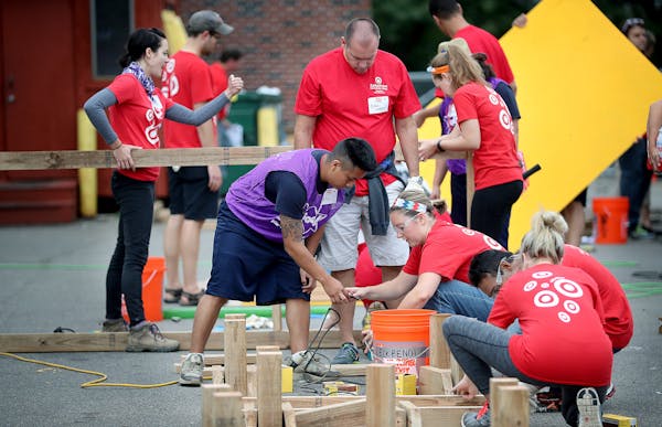 Target employees teamed up with Ka-Boom to build a playground at the Sabathani Community Center, Friday, September 16, 2016 in Minneapolis, MN. ] (ELI