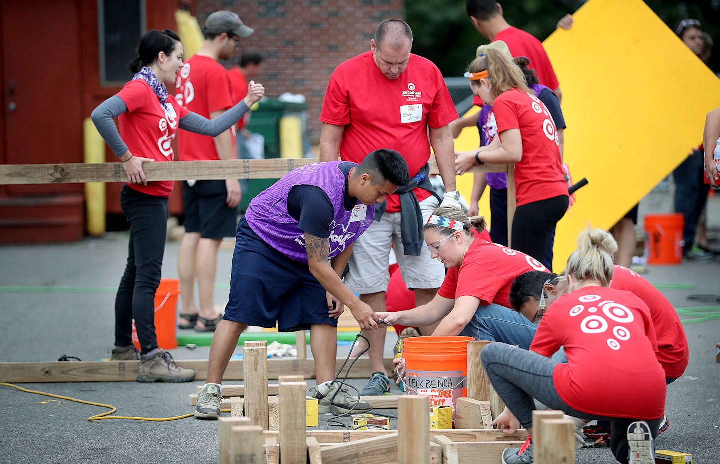 Target employees teamed up with Ka-Boom to build a playground at the Sabathani Community Center, Friday, September 16, 2016 in Minneapolis, MN. ] (ELIZABETH FLORES/STAR TRIBUNE) ELIZABETH FLORES &#x2022; eflores@startribune.com