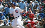 The Chicago Cubs' Chris Gimenez flies out against the Philadelphia Phillies on Thursday, June 7, 2018, at Wrigley Field in Chicago. The Cubs won, 4-3.