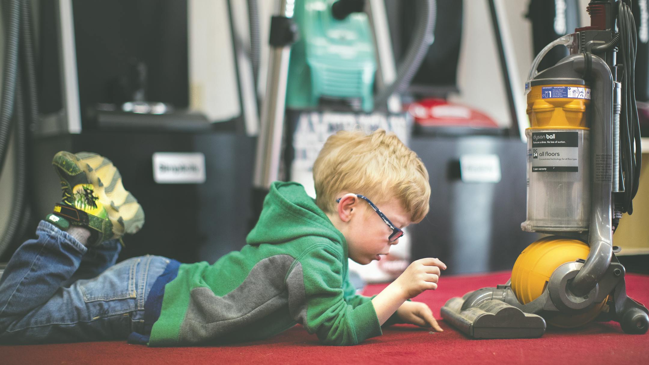 Ben Liestman, 6, played with a Dyson DC24 he had spotted in the backroom of Osseo Vacuum while at the sales and repair shop with his dad, Joel. Ben has Williams syndrome.