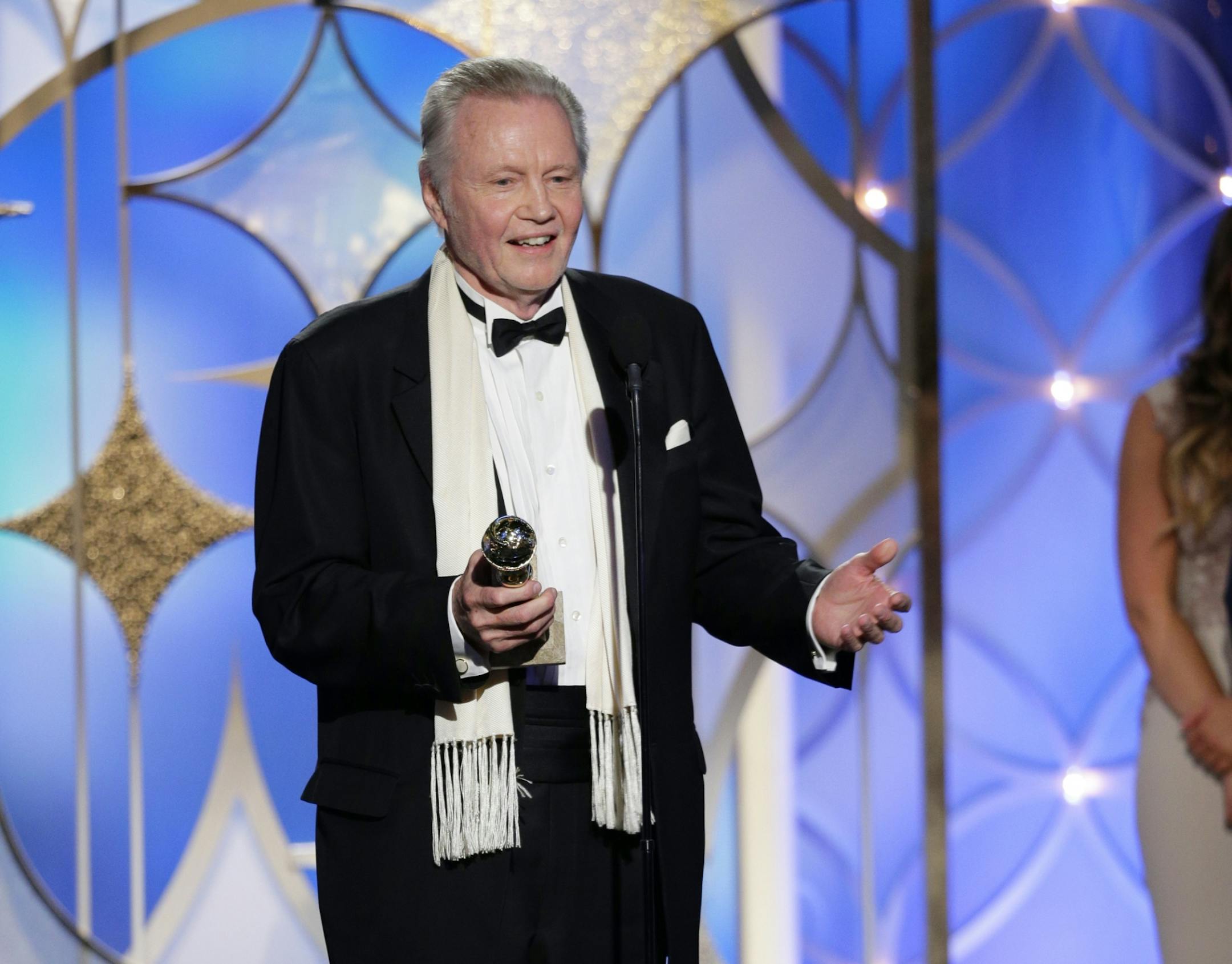This image released by NBC shows Jon Voight accepting the award for best supporting actor in a series, mini-series or TV movie for his role in "Ray Donovan" during the 71st annual Golden Globe Awards at the Beverly Hilton Hotel on Sunday, Jan. 12, 2014, in Beverly Hills, Calif.