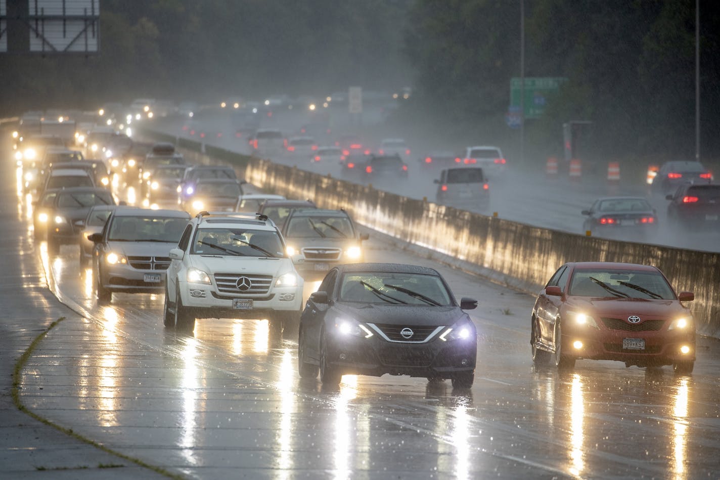 Rush hour traffic lit up 35E as it made its way northbound toward downtown St. Paul in the rain, Thursday, September 12, 2019. The Twin Cities could see one to two inches of rain Thursday.