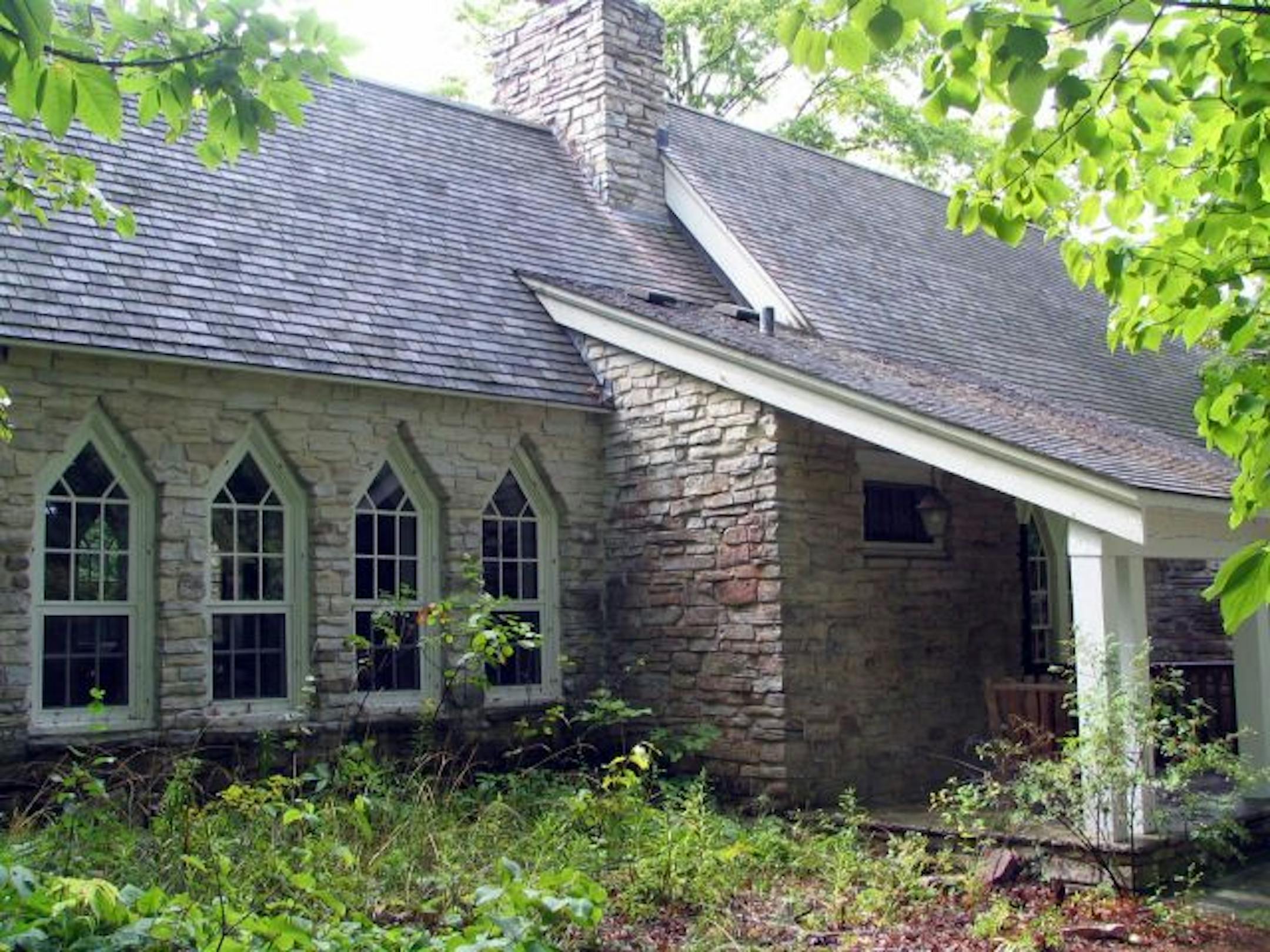 Historic stone buildings, including this schoolhouse used for classes, fit snugly into the woods at The Clearing Folk School in Door County, Wis.
