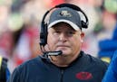 FILE - In this Jan. 1, 2017, file photo, San Francisco 49ers head coach Chip Kelly stands on the sideline during the second half of an NFL football ga