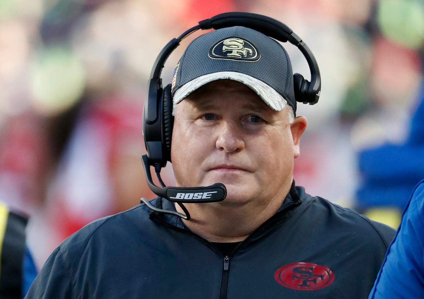 FILE - In this Jan. 1, 2017, file photo, San Francisco 49ers head coach Chip Kelly stands on the sideline during the second half of an NFL football game against the Seattle Seahawks in Santa Clara, Calif. Former Oregon coach Chip Kelly is joining ESPN as a studio analyst next season. ESPN announced Friday, May 26, 2017, it has signed Kelly to a multiyear deal. (AP Photo/Tony Avelar, File)