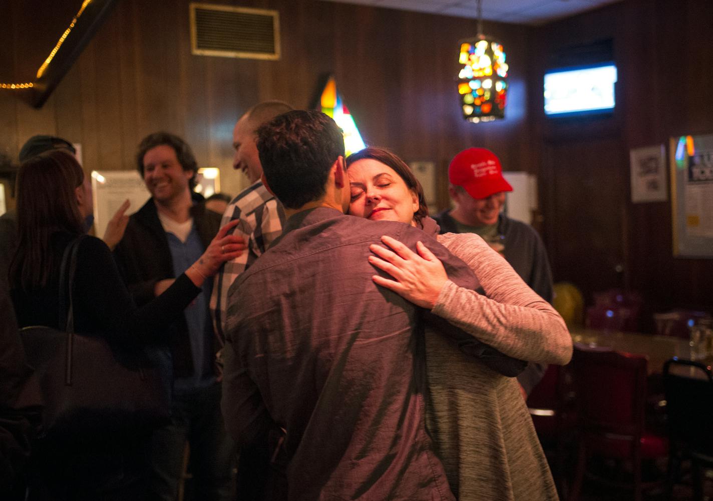 Allison Albritton of Minneapolis danced with Erez Lirov, a Nye's regular who often brings in his trumpet to accompany the karaoke singers at the piano bar.