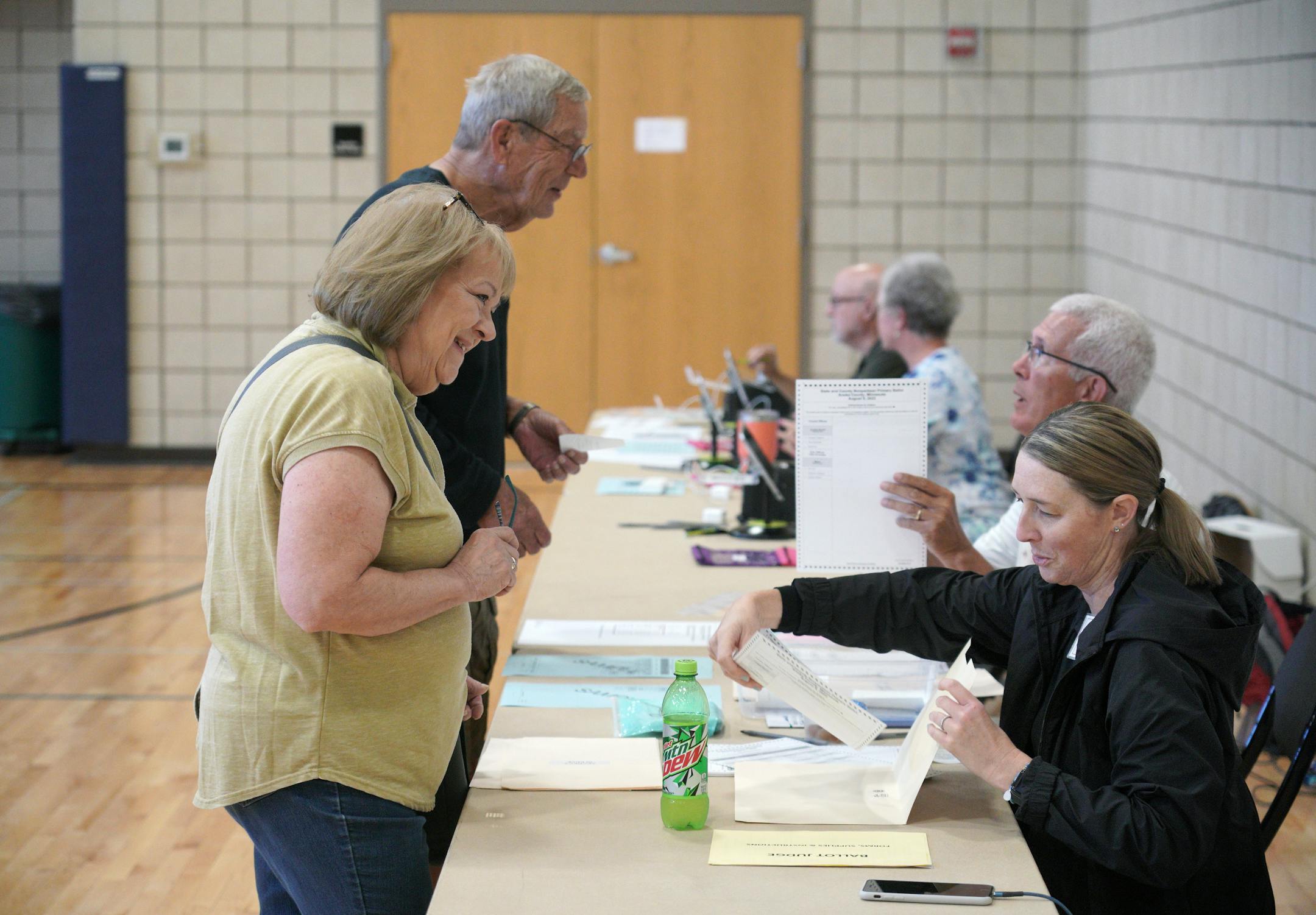 Voters received instruction on how to cast primary ballots at Zion Lutheran Church in Anoka.