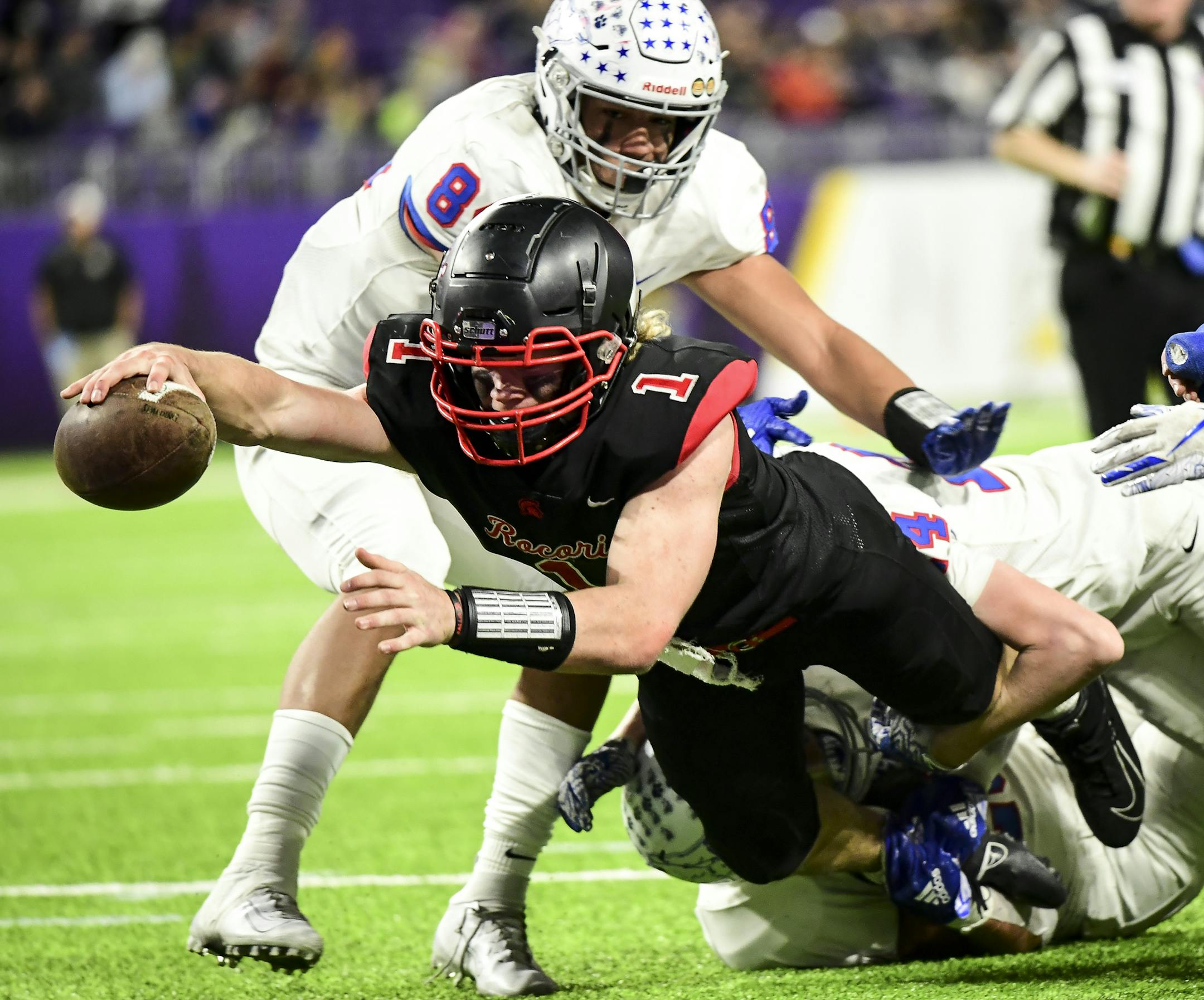 Rocori quarterback Jack Steil (1) leapt for a touchdown in the second half against the SMB Wolfpack. ] Aaron Lavinsky &#x2022; aaron.lavinsky@startribune.com SMB Wolfpack played Rocori in the Class 4A State Tournament Championship game on Friday, Nov. 29, 2019 at US Bank Stadium in Minneapolis, Minn.