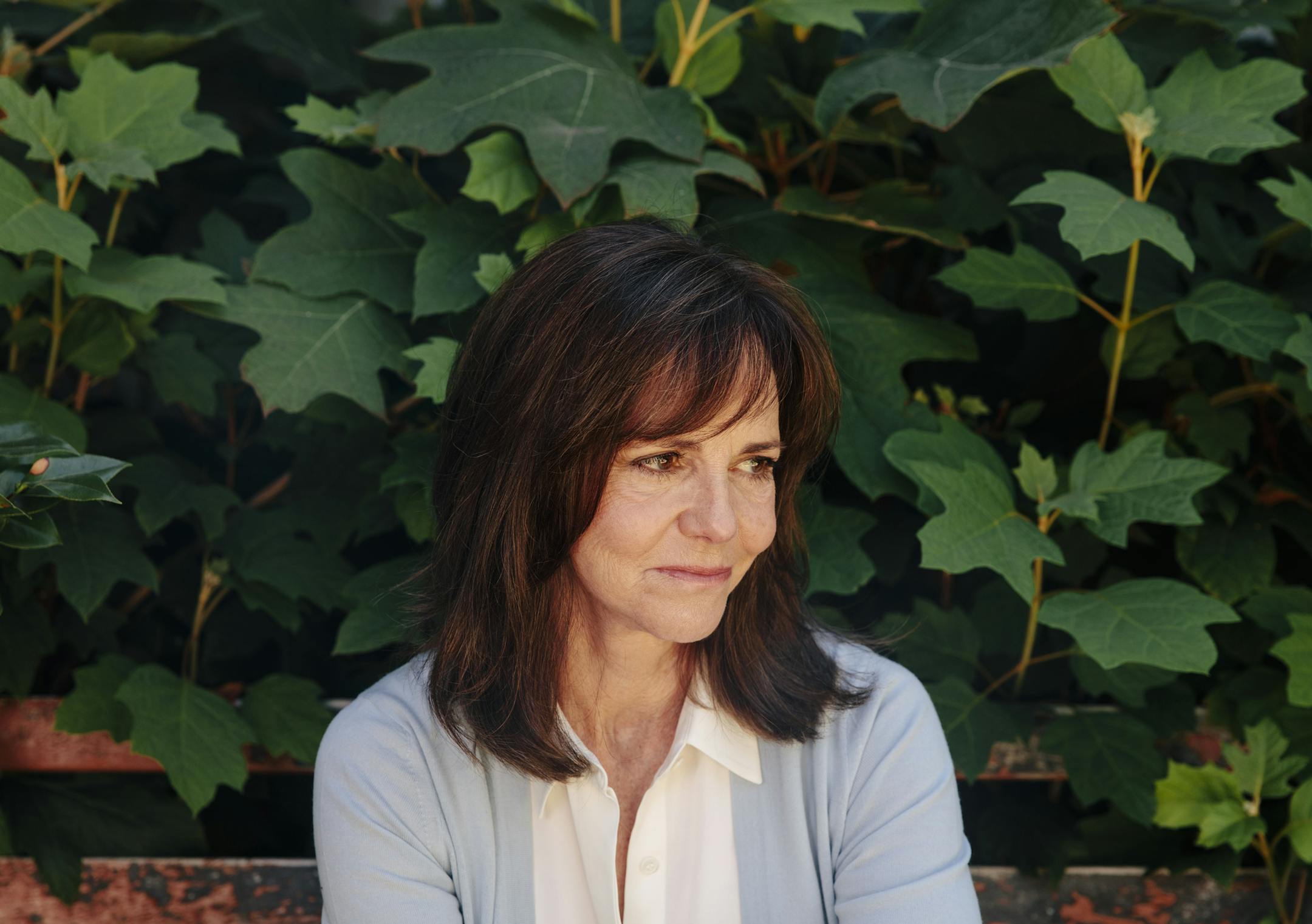 Sally Field, whose new memoir ìIn Piecesî is out soon, at home in Pacific Palisades, Calif., Aug. 29, 2018. Though ìIn Piecesî does delve into some of Fieldís famous roles and relationships, it is no traditional showbiz autobiography, illuminating a life darkened by abuses and cruelties that are frustratingly commonplace for women, in Hollywood and out. (Brinson+Banks/The New York Times)
