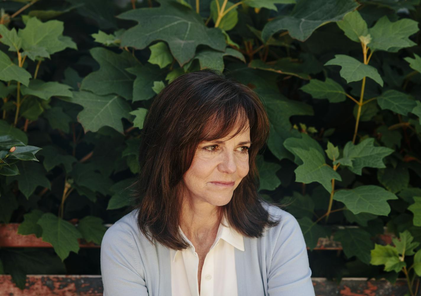 Sally Field, whose new memoir &#xec;In Pieces&#xee; is out soon, at home in Pacific Palisades, Calif., Aug. 29, 2018. Though &#xec;In Pieces&#xee; does delve into some of Field&#xed;s famous roles and relationships, it is no traditional showbiz autobiography, illuminating a life darkened by abuses and cruelties that are frustratingly commonplace for women, in Hollywood and out. (Brinson+Banks/The New York Times)