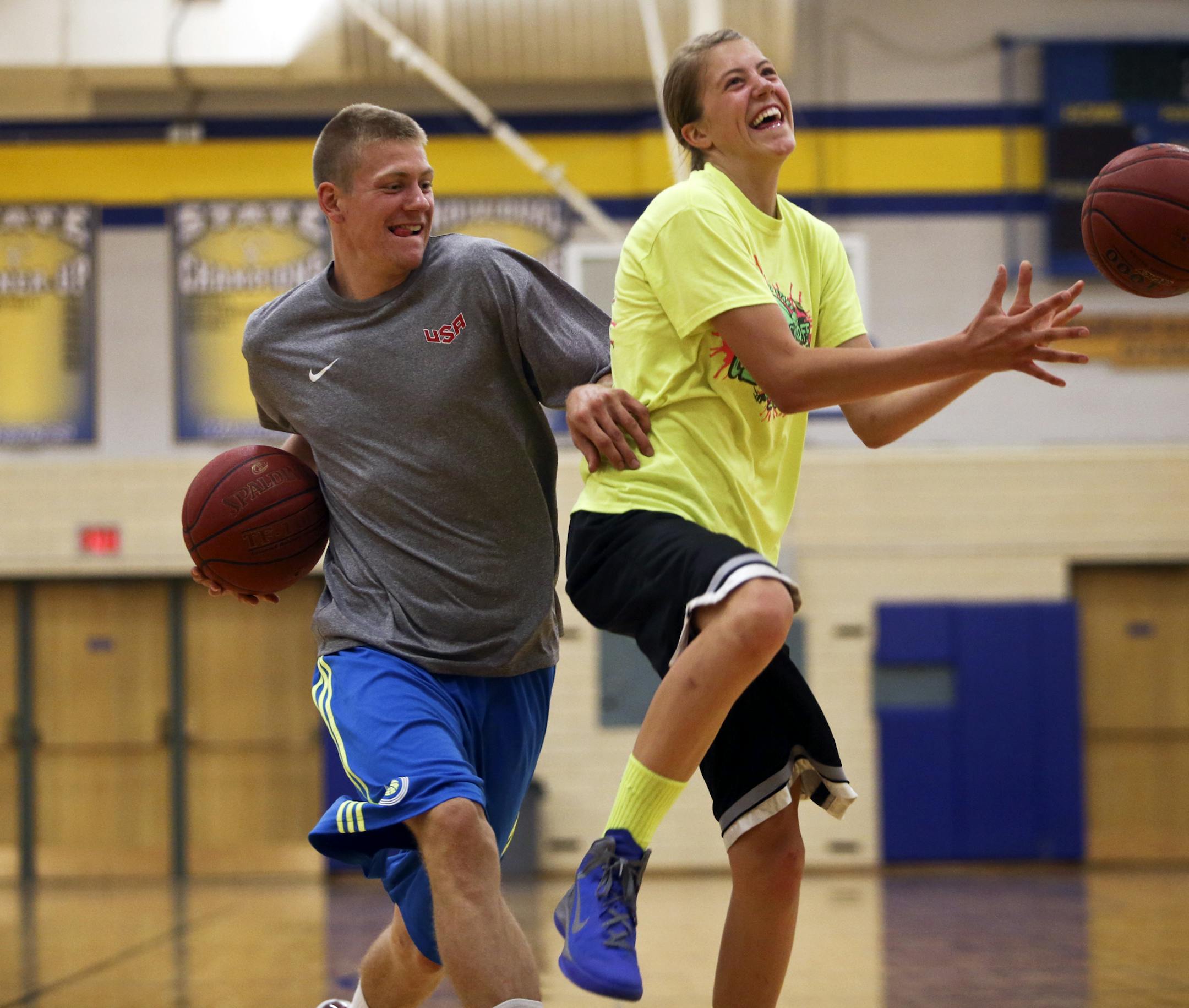 While practicing basketball at Rice Lake High with his siblings, Wally Ellenson, left, a two-sport star at the U of M, playfully chases down his sister Ella Saturday, Aug. 17, 2013, in Rice Lake, WI.](DAVID JOLES/STARTRIBUNE) djoles@startribune.com Gophers basketball player Wally Ellenson comes from a basketball family, or rather a sports family. Wally, a sophomore at the U of M, has siblings who all play hoops: Brother Ellwood is heading to Bemidji State, underclassman brother Henry is already