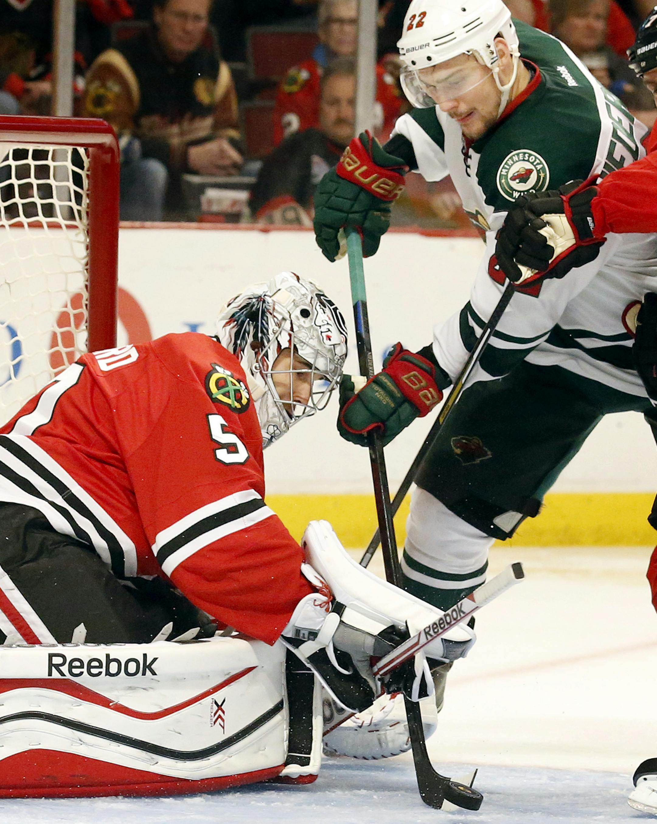 Nino Niederreiter (22) attempted a shot against Chicago Blackhawks goalie Corey Crawford (50) in the third period. ] CARLOS GONZALEZ cgonzalez@startribune.com - May 11, 2014, Chicago, Illinois, United Center, NHL, Minnesota Wild vs. Chicago Blackhawks, Stanley Cup Playoffs Round 2, Game 5
