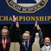 Ava Bruegger of New Prague, Taylar Schaefer of St. Cloud, center, and Hannah Maccarone of Eagan stand on the winners podium following the Minnesota St