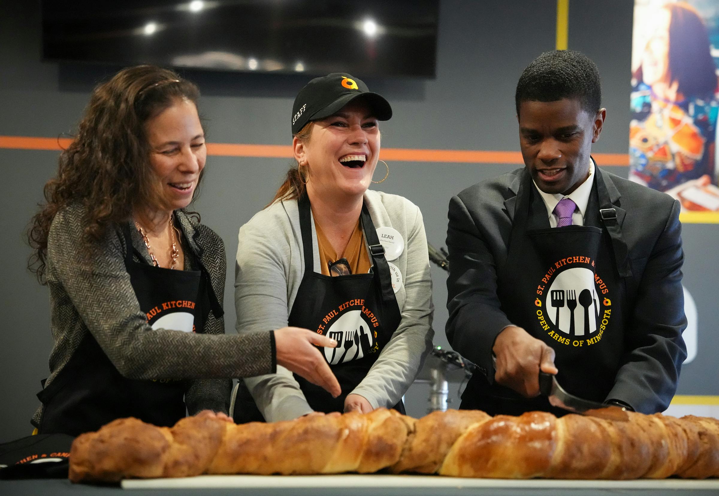 Open Arms Minnesota celebrates new space with 'bread cutting'