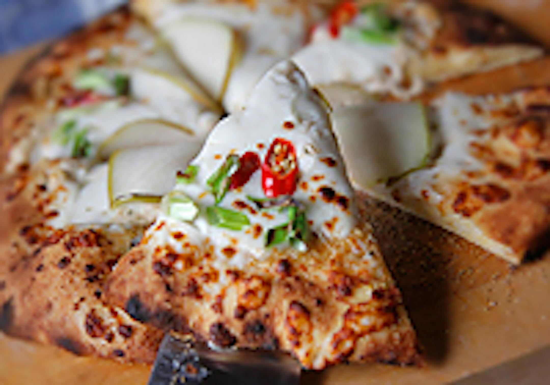 The pepper pear personal pizza, cooked in an outdoor oven, from Third Street Deli in Pepin