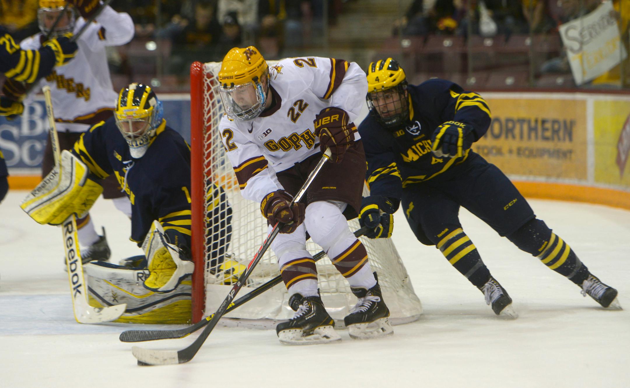 Travis Boyd attempts to score in the third period of the Minnesota Gophers men's hockey game vs. Michigan Wolverines on Saturday, February 15, 2014 in Minneapolis, Minn.
