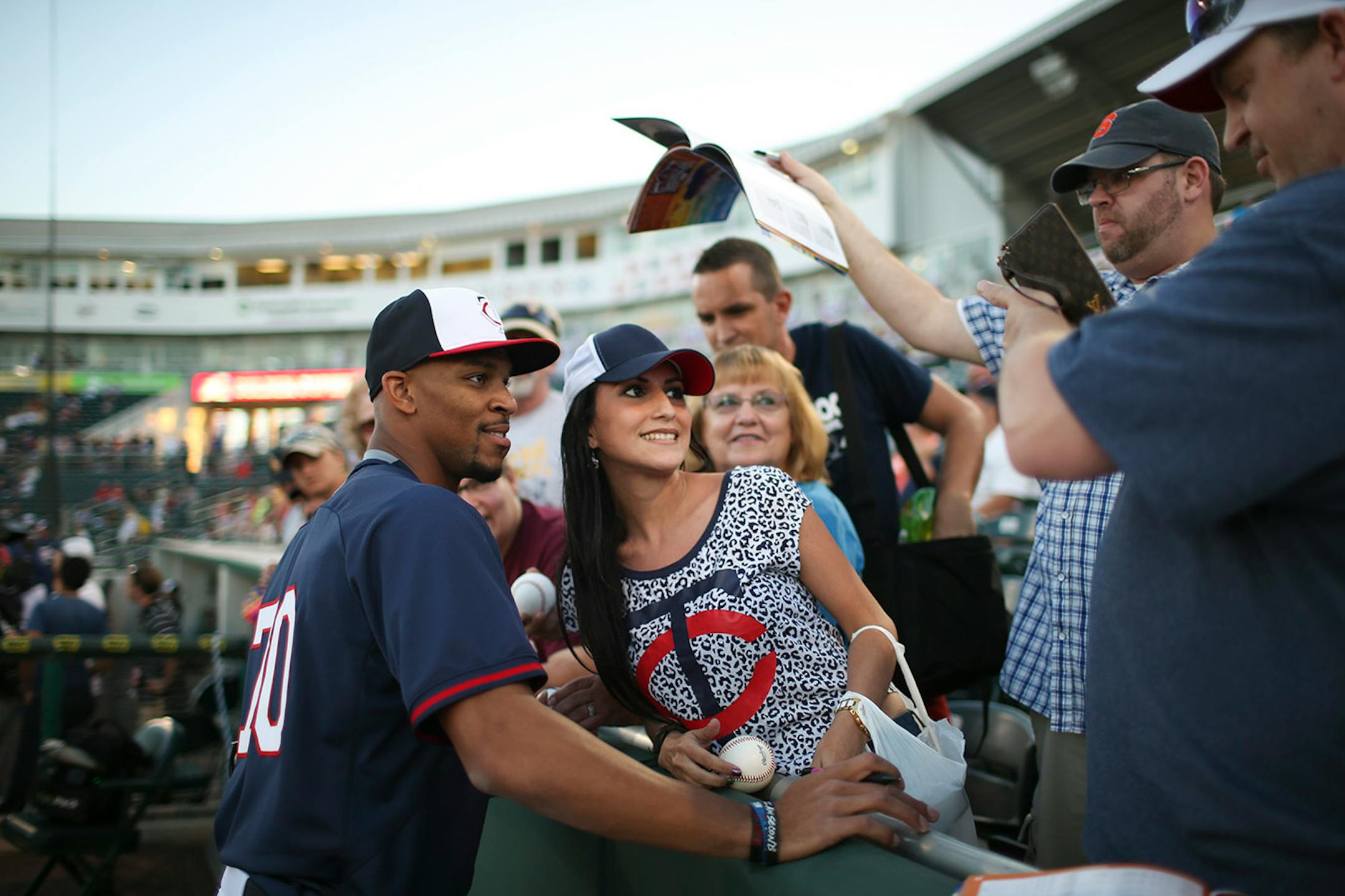 Minnesota Twins center fielder Byron Buxton posed with a fan before Wednesday night's game against the Gophers at Hammond Stadium.