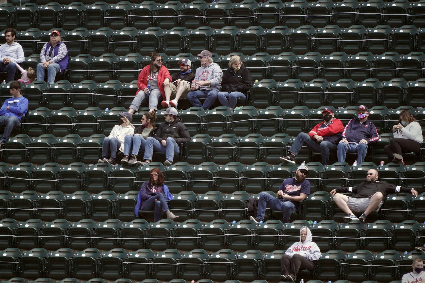 Twins fans will be happy to hear about the lifting of covid restrictions including mask wearing and social distancing by July 1st. ] Texas Rangers at Minnesota Twins, Target Field.