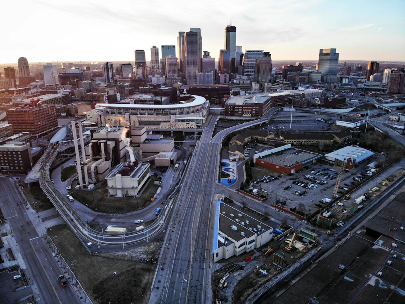 A stillness has settled over the Twin Cities with the stay-at-home order. Few cars were heading into downtown Minneapolis on Monday morning, though the skyline still reflected the glow of sunrise.