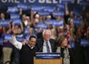 Minnesota&#x2019;s U.S. Rep. Keith Ellison stood with Sen. Bernie Sanders and his wife, Jane O&#x2019;Meara Sanders, after introducing the Democratic 