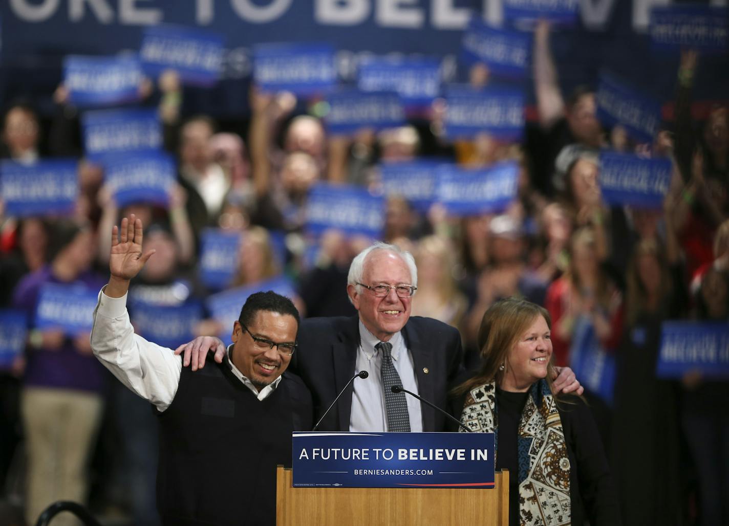 Minnesota&#x2019;s U.S. Rep. Keith Ellison stood with Sen. Bernie Sanders and his wife, Jane O&#x2019;Meara Sanders, after introducing the Democratic presidential candidate Tuesday night at St. Paul&#x2019;s RiverCentre.