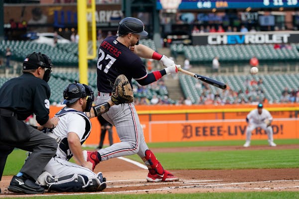 Minnesota Twins' Ryan Jeffers connects for a three-run home run during the first inning of a baseball game against the Detroit Tigers, Monday, Aug. 7,