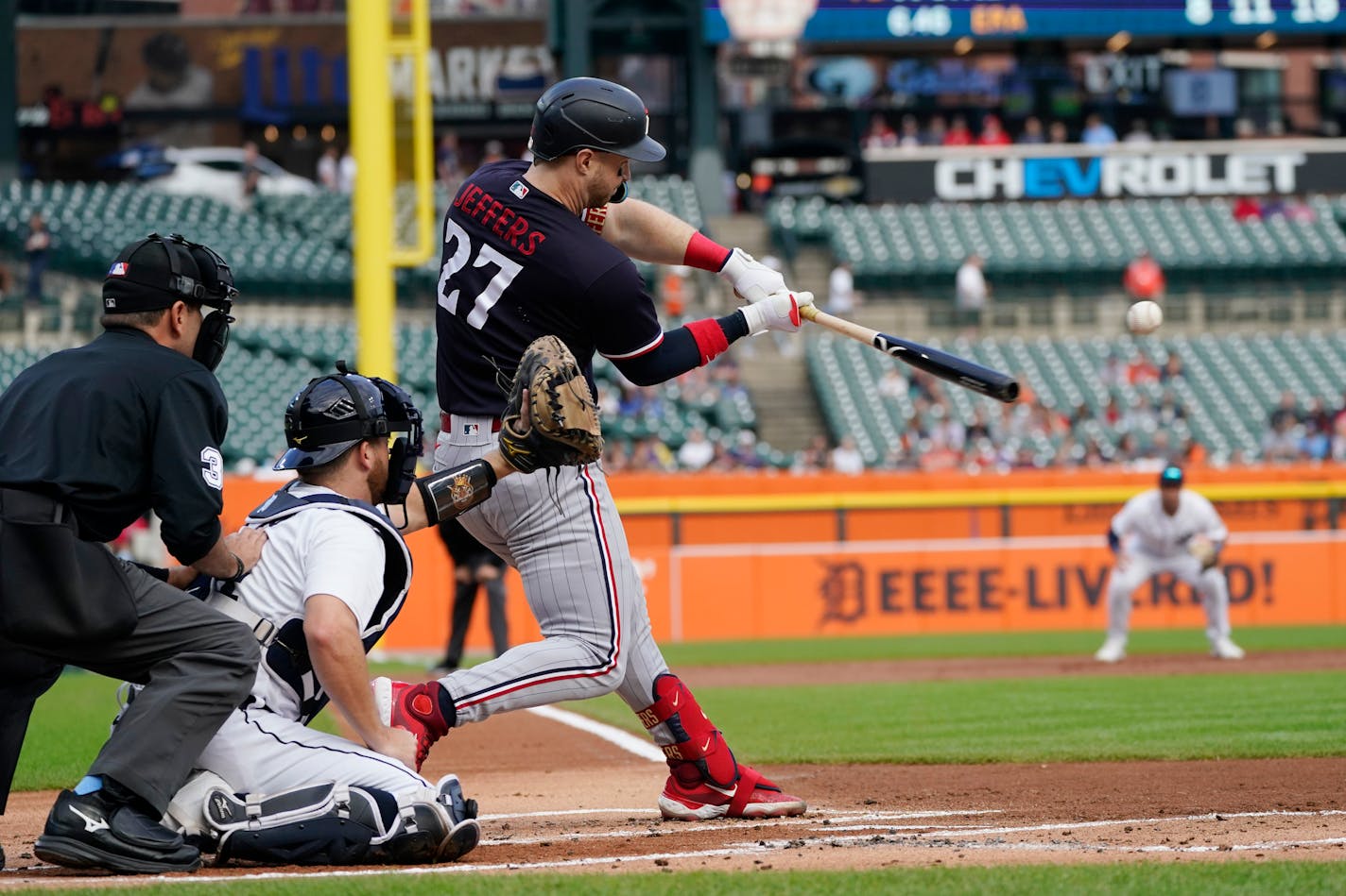 Minnesota Twins' Ryan Jeffers connects for a three-run home run during the first inning of a baseball game against the Detroit Tigers, Monday, Aug. 7, 2023, in Detroit. (AP Photo/Carlos Osorio)