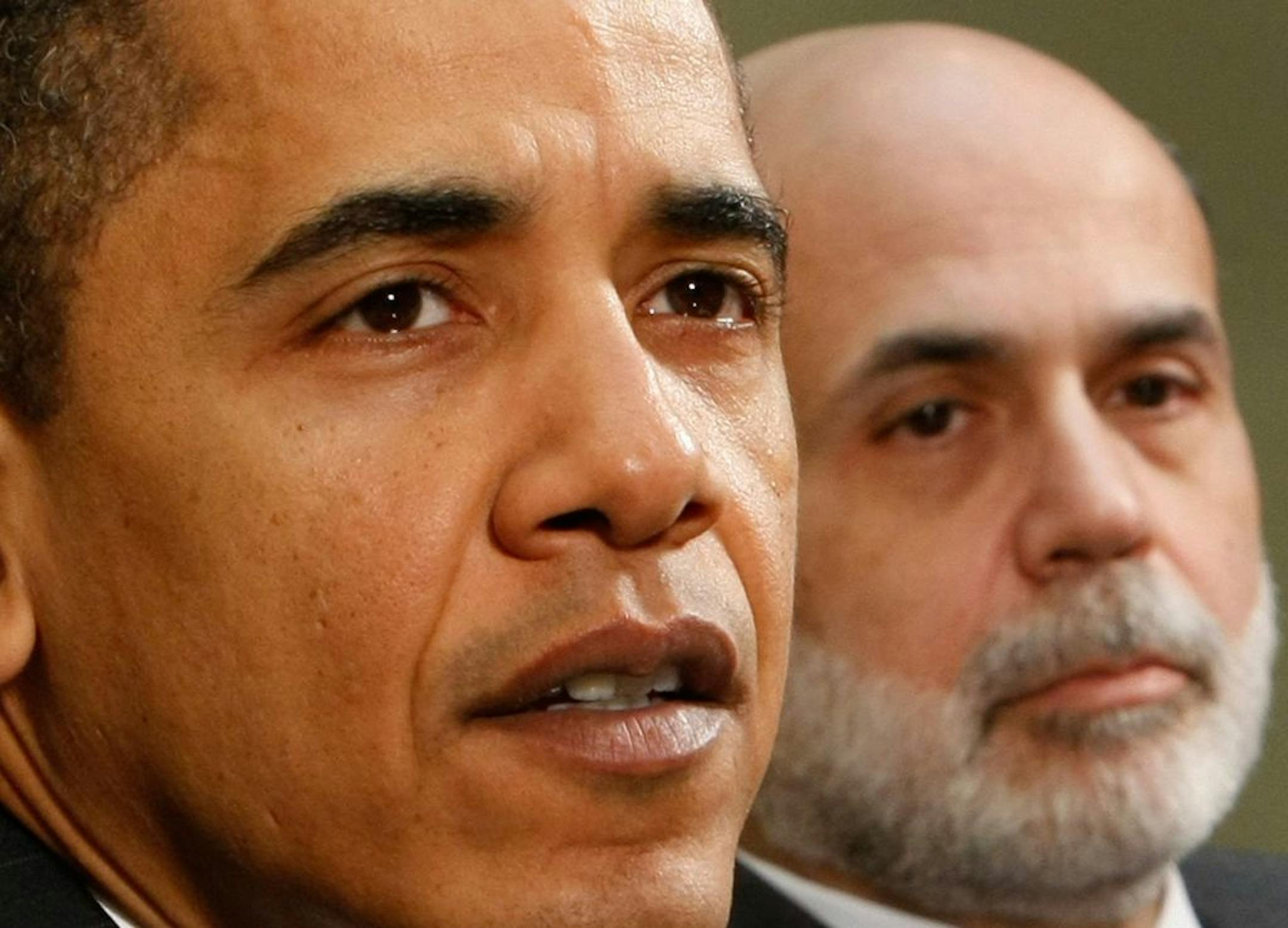 President Barack Obama, accompanied by Federal Reserve Chairman Ben Bernanke, makes remarks in the Roosevelt Room of the White House in Washington, Friday, April 10, 2009.