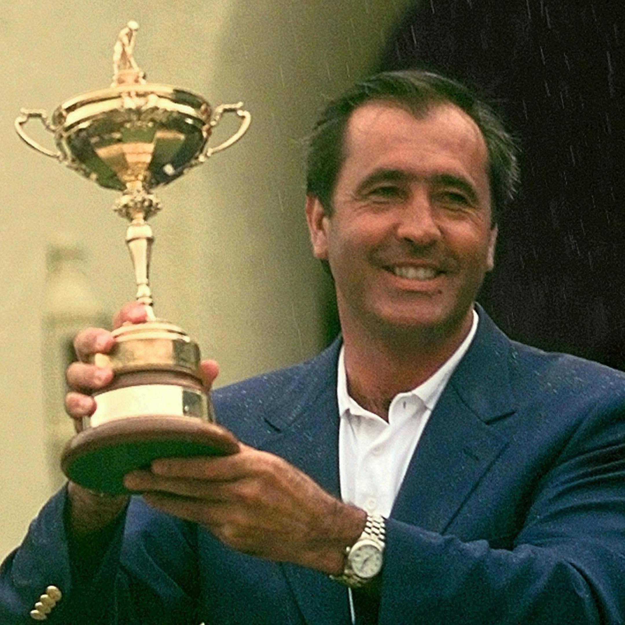 European Ryder Cup team captain Severiano Ballesteros holds the trophy after Europe beat the United States 14 1/2 to 13 1/2 to win the Ryder Cup at Valderrama golf course, southern Spain Sunday Sept. 28, 1997. (AP Photo/Dave Martin) ORG XMIT: RYD156