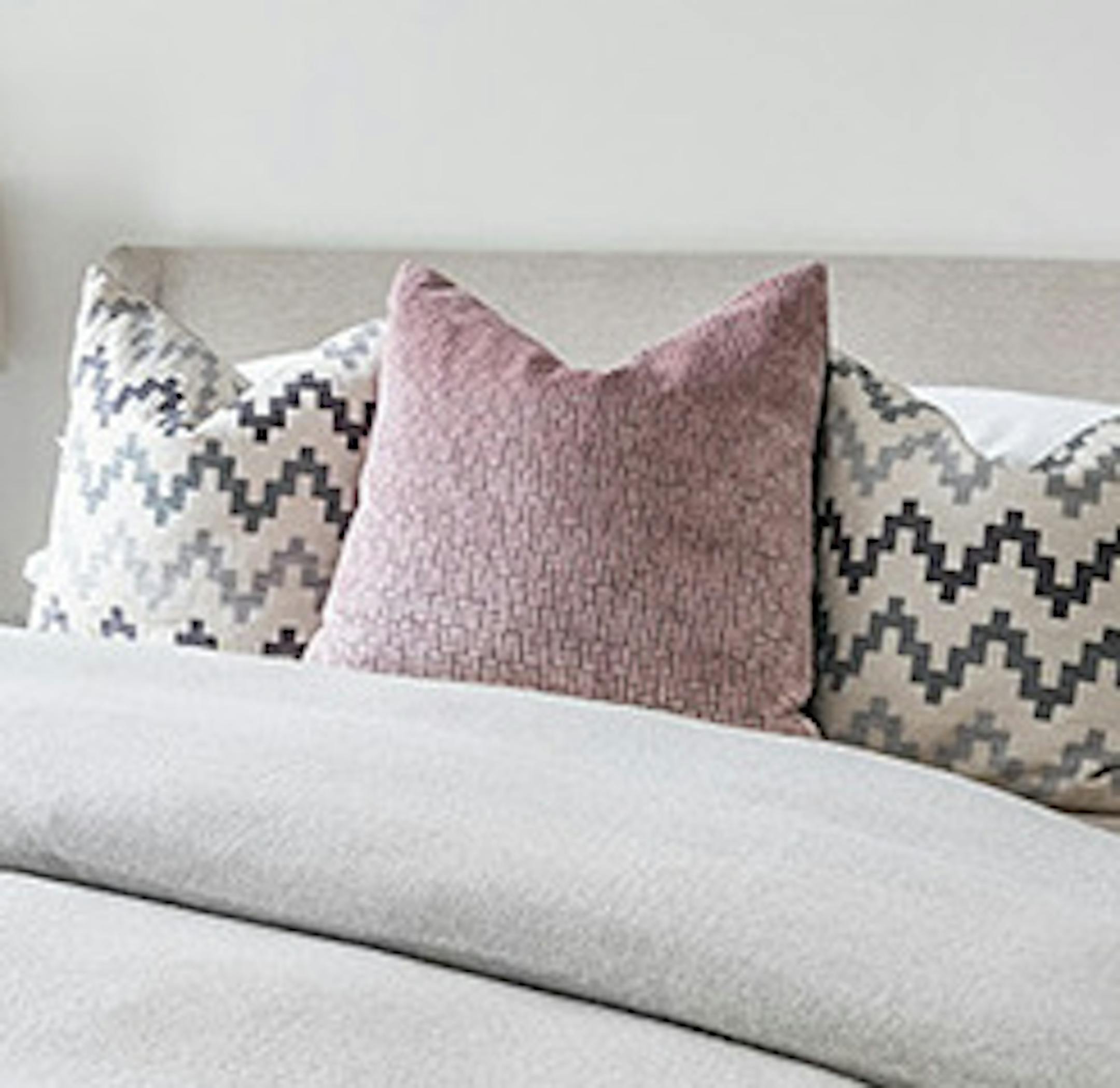 Pairing gray with pastel pink helps create a soft and inviting bedroom experience. ORG XMIT: 1311179