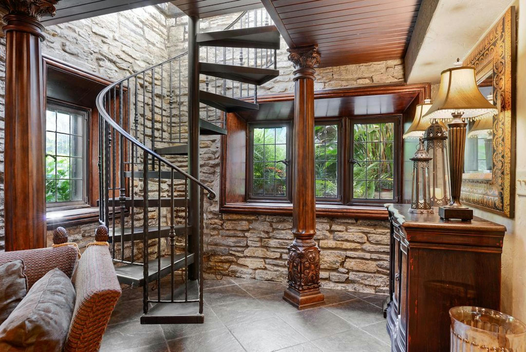 The spiral staircase to the walkout lower level.