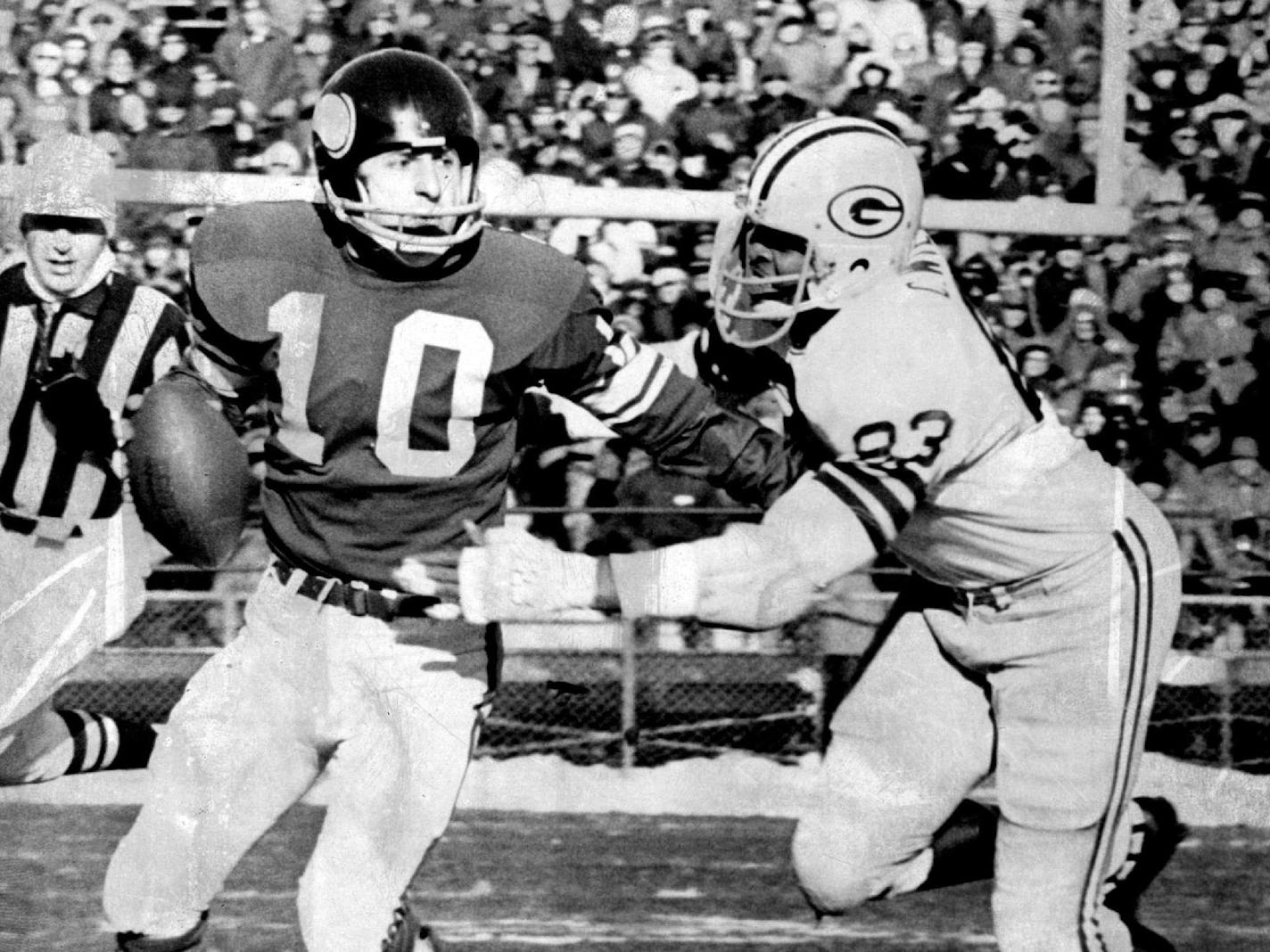 December 11, 1972 Viking Fran Tarkenton is in trouble during first quarter of yesterday's game against the Green Bay Packers. Drawing a bead on the Minnesota quarterback is defensive end Clarence Williams. Defensive plays like this helped Packers to a 23-7 victory and cinched the National Football Conference's Central Division title for Green Bay. December 10, 1972 Larry Schreiber, Minneapolis Star Tribune ORG XMIT: MIN2017012623123183 ORG XMIT: MIN1808252058080176