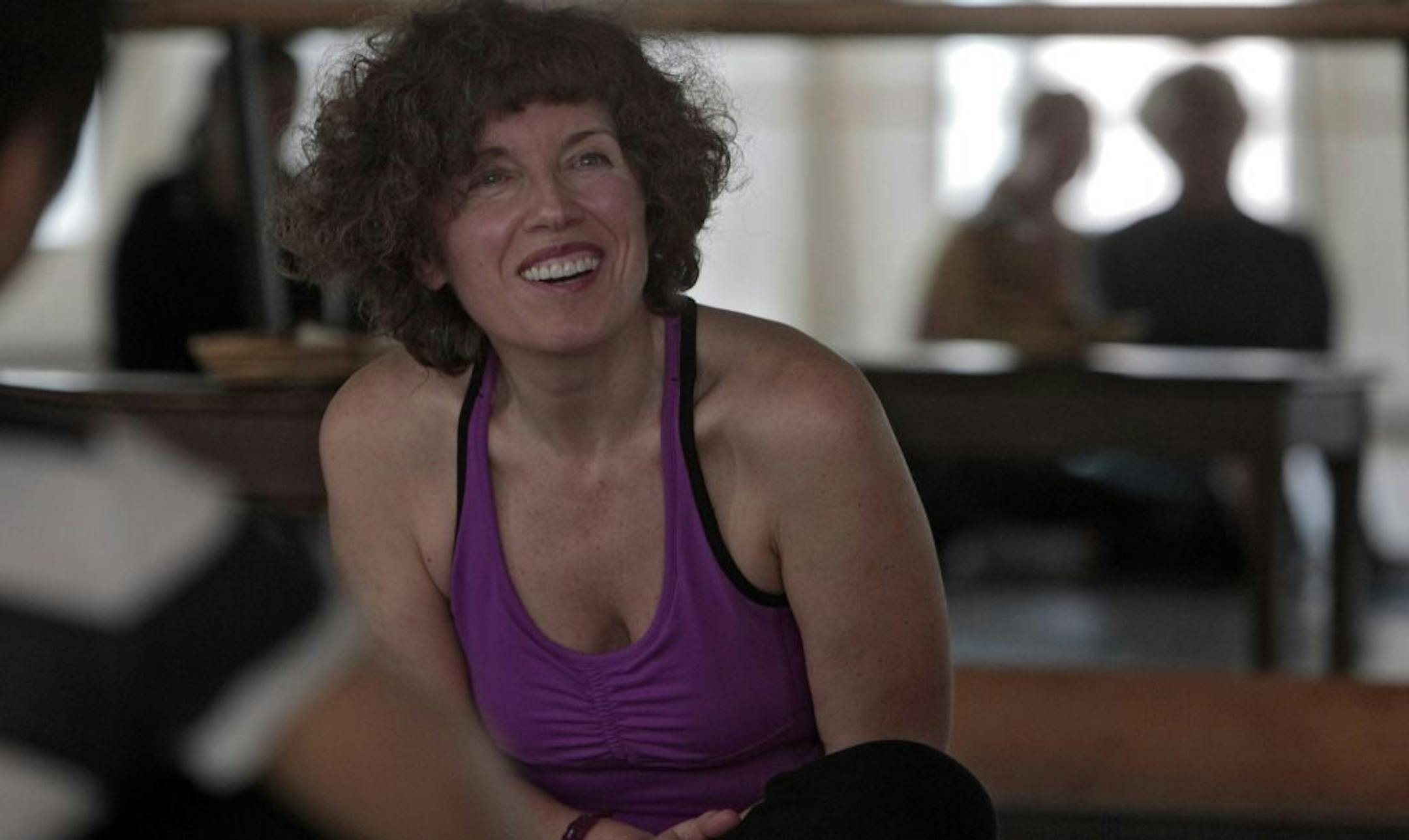 Anna Bonavita talked about chocolates to people in her yoga session in Minneapolis. Chocolate Bonavita is an organization devoted to a chocolate revolution, introducing people to the finest grades of chocolate which, if supported, can help restore the rain forests and even make us healthier.