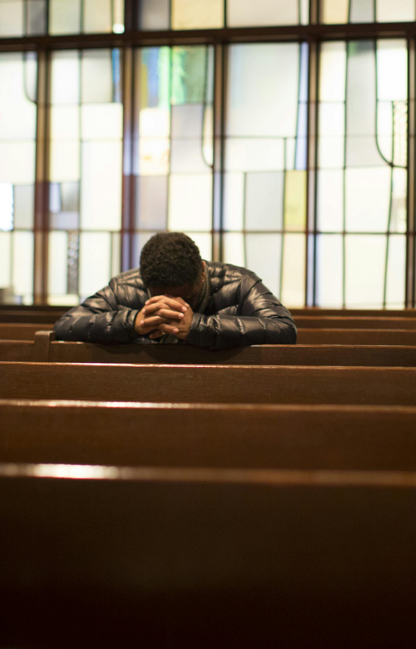 A man prayed during noon mass at Saint Olaf Catholic Church on Friday, January 16, 2015, in Minneapolis, Minn. ] RENEE JONES SCHNEIDER &#x2022; renee.jones@yahoo.com